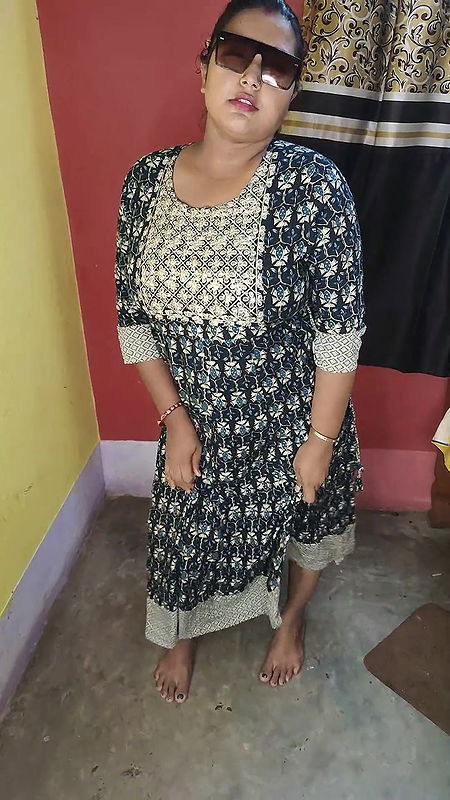 Indian peeing at her home