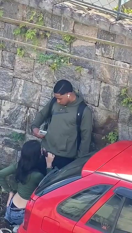 Young girl sucking a black guy’s dick in public 22