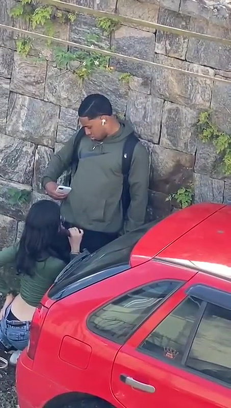Young girl sucking a black guy’s dick in public 22