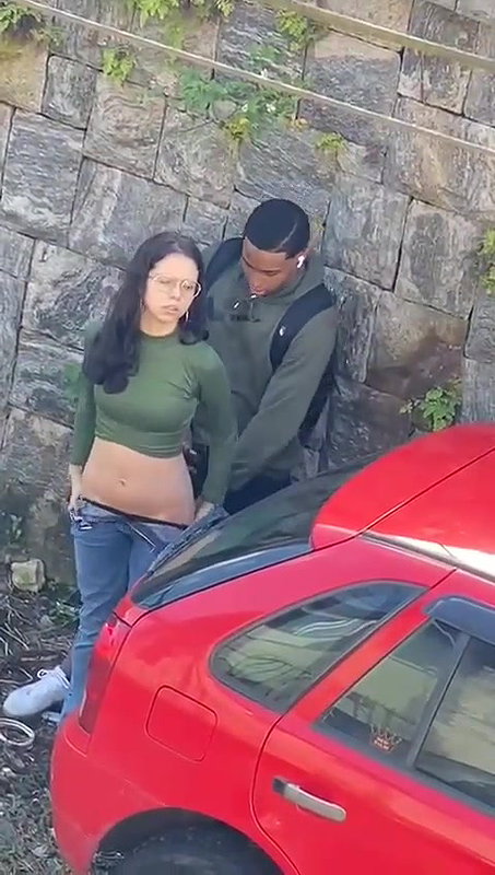 Young girl sucking a black guy’s dick in public 22