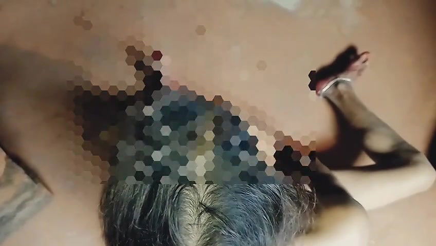 Beautiful Woman Relaxing Alone in Her Bedroom