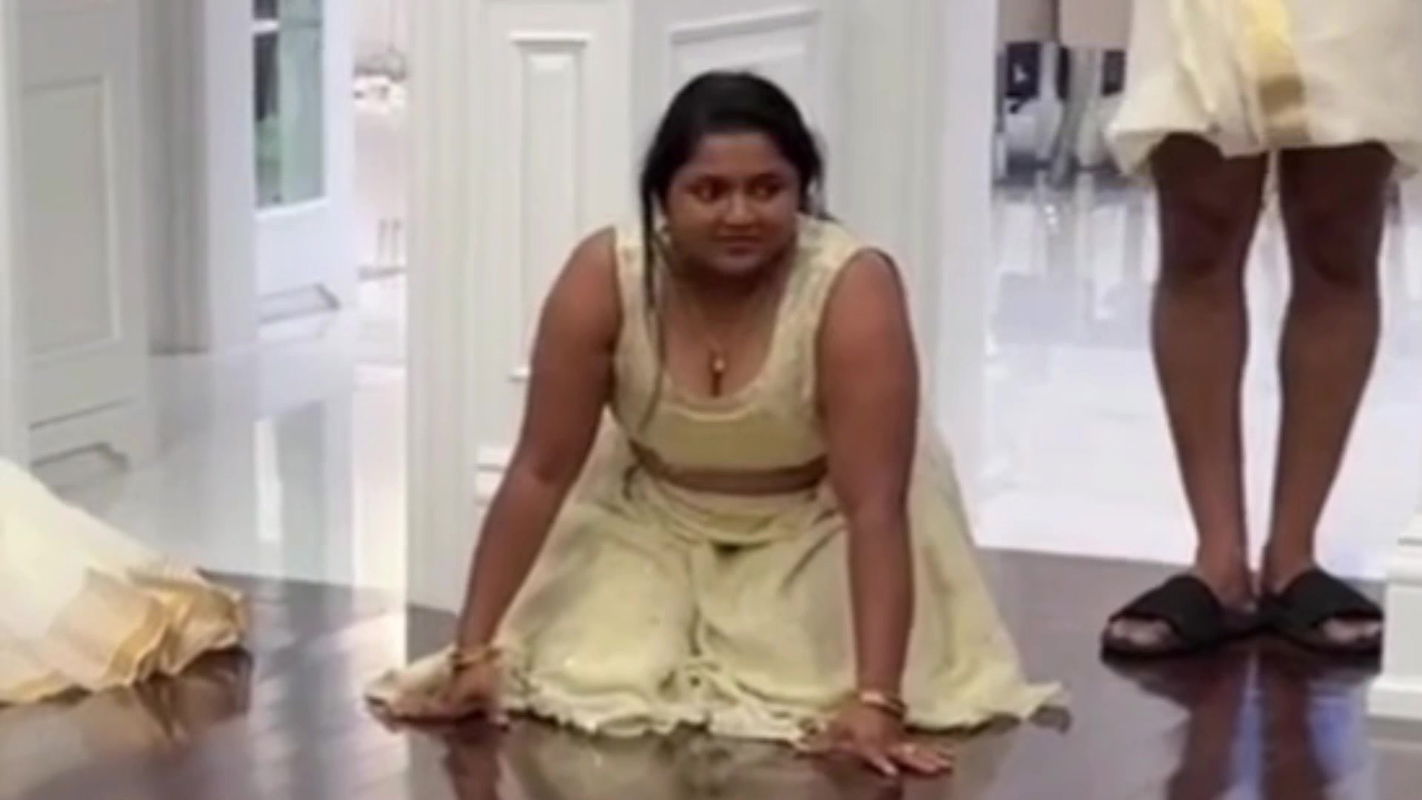 Malayali busty lady wide cleavage show in cream costume 22