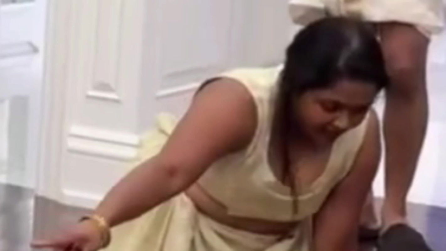 Malayali busty lady wide cleavage show in cream costume 22