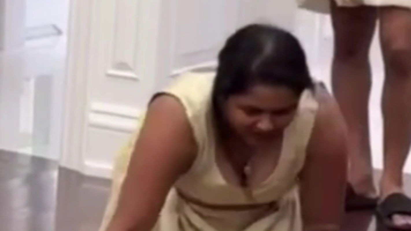 Malayali busty lady wide cleavage show in cream costume 22