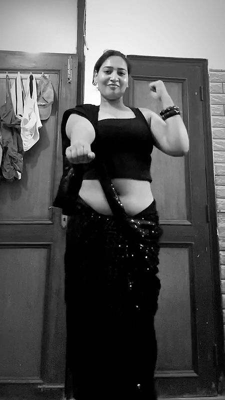 assam chubby lady deep navel in black saree 22