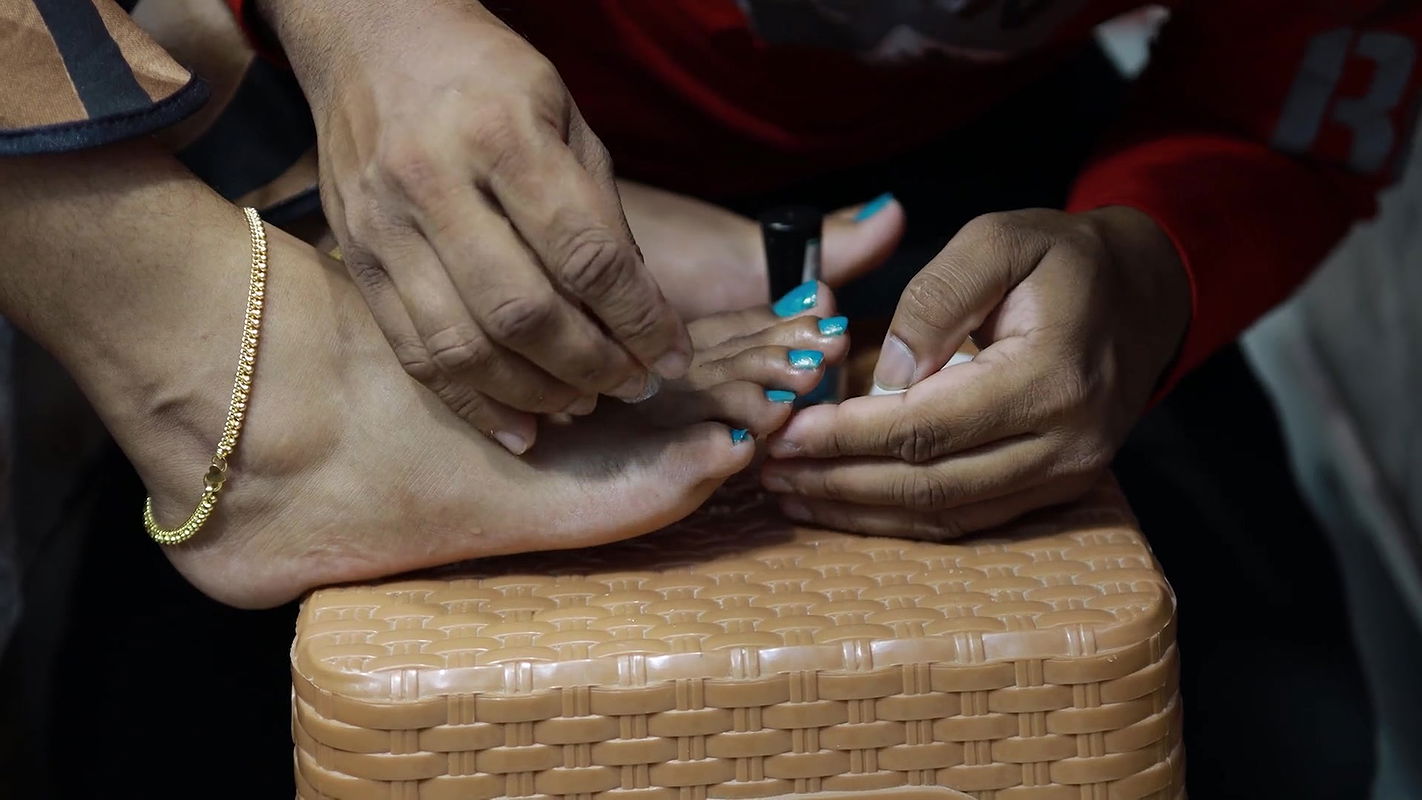 Boy Put Nail Polish on Girl Feet