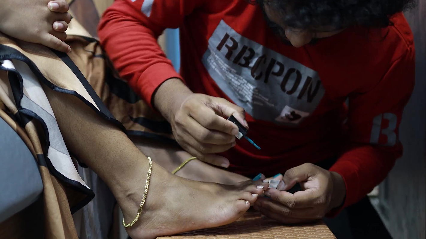 Boy Put Nail Polish on Girl Feet