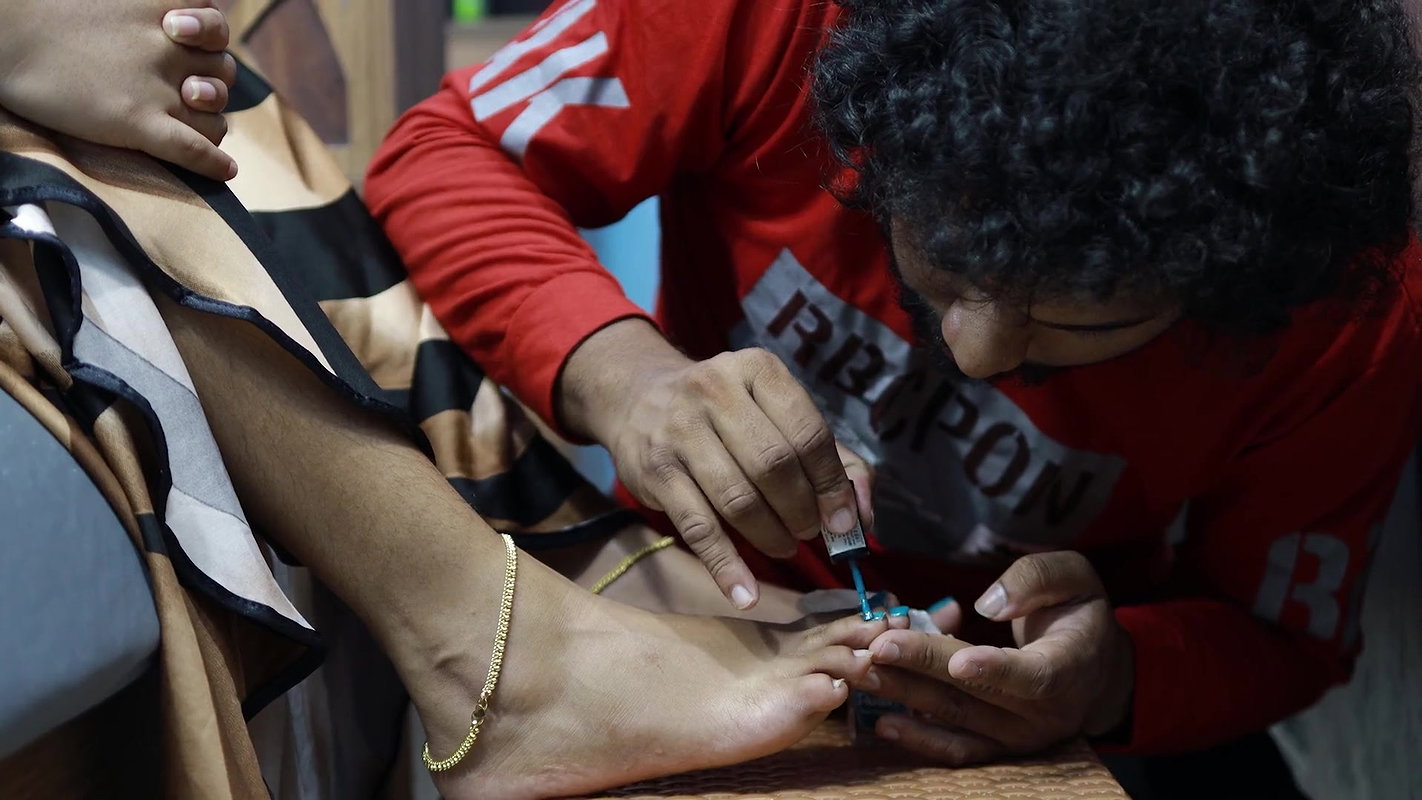 Boy Put Nail Polish on Girl Feet