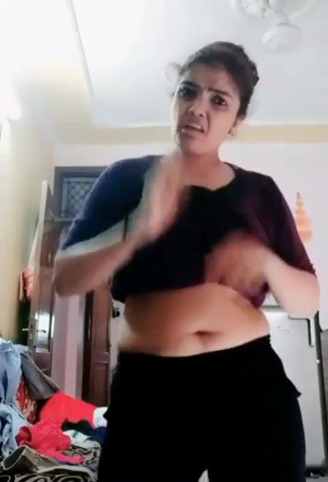 desi Chubby aunty Big Deep Navel in grey tshirt and black pants