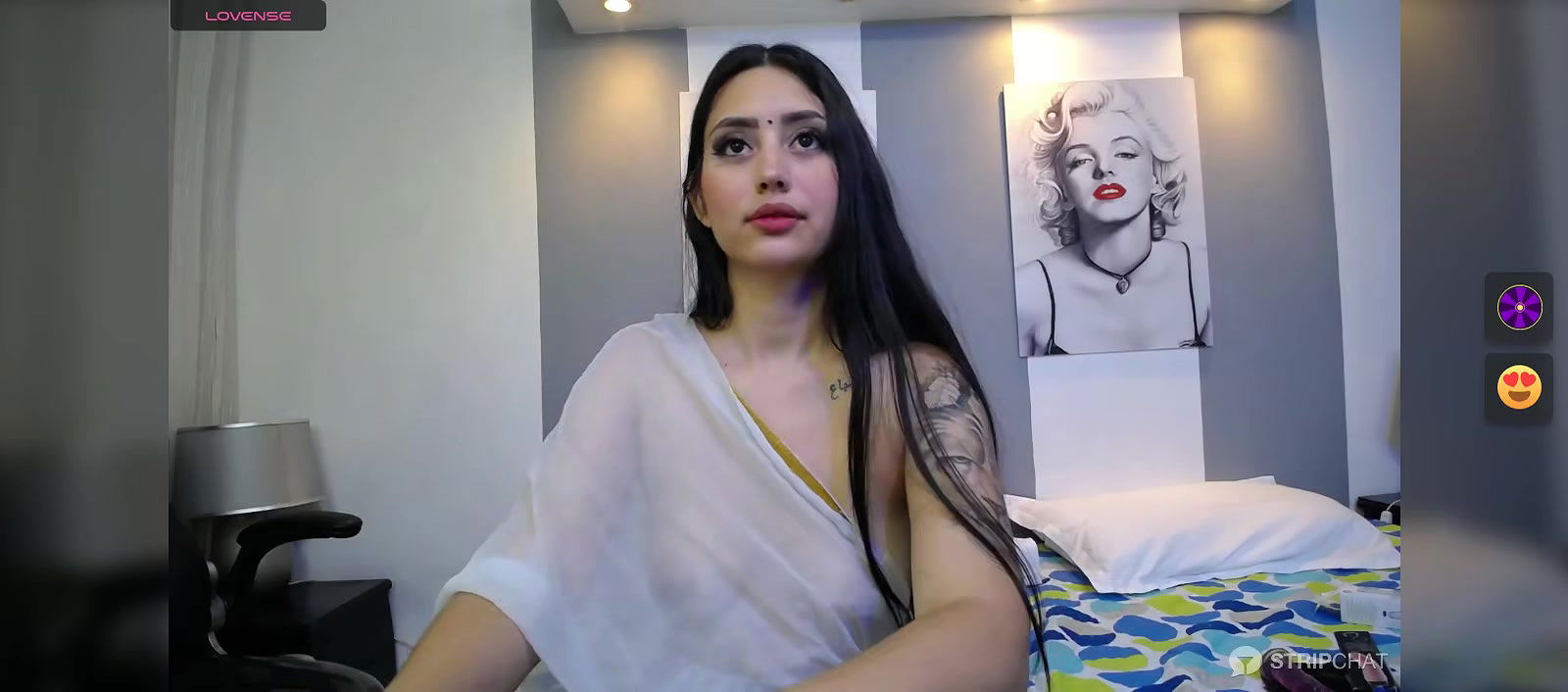 Hot beauty in see through white saree showing her boobs