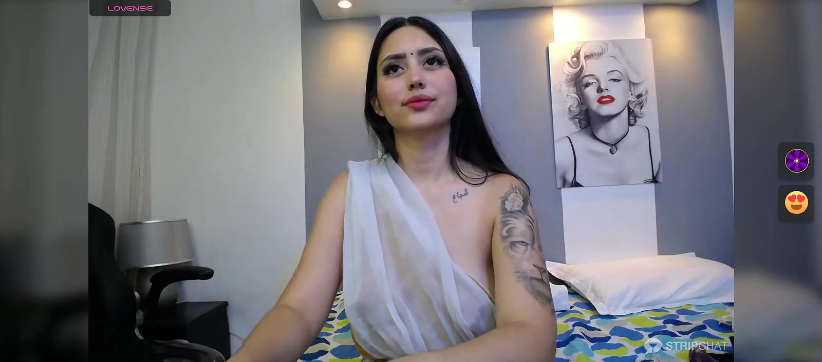 Hot beauty in see through white saree showing her boobs