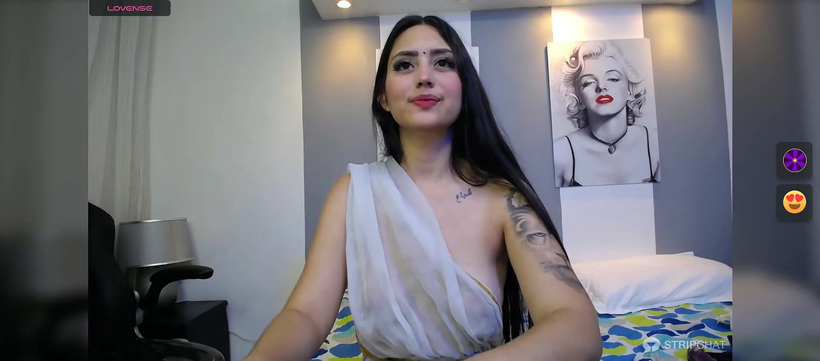 Hot beauty in see through white saree showing her boobs