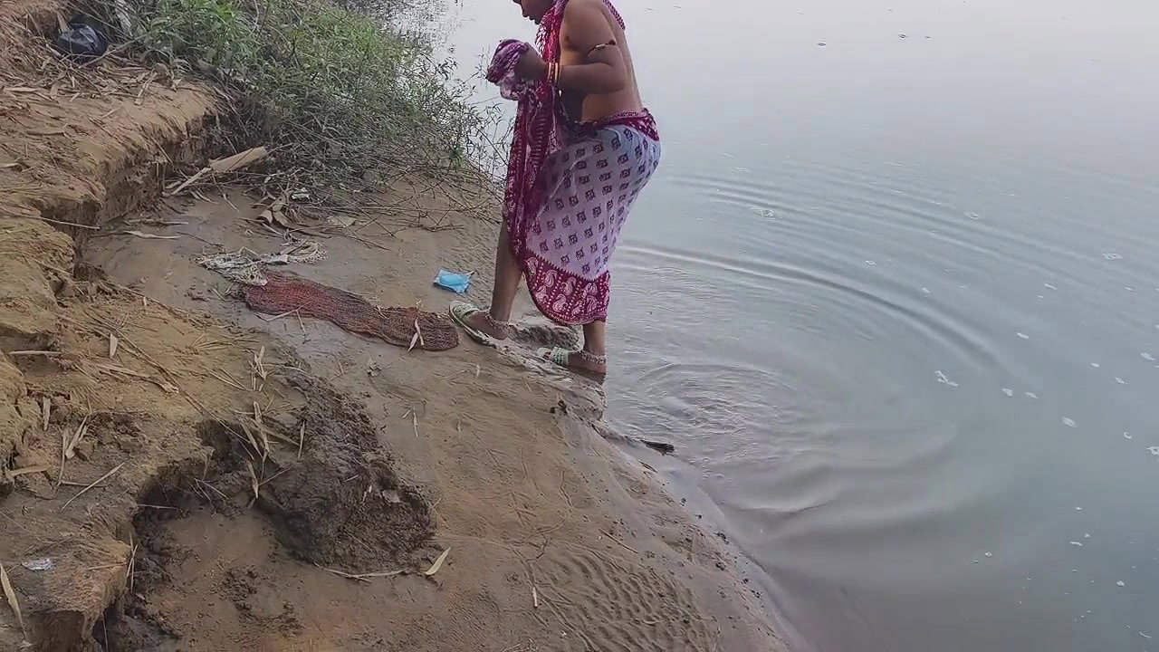 Indian Village Wife Bathing in the River in Outdoor Area
