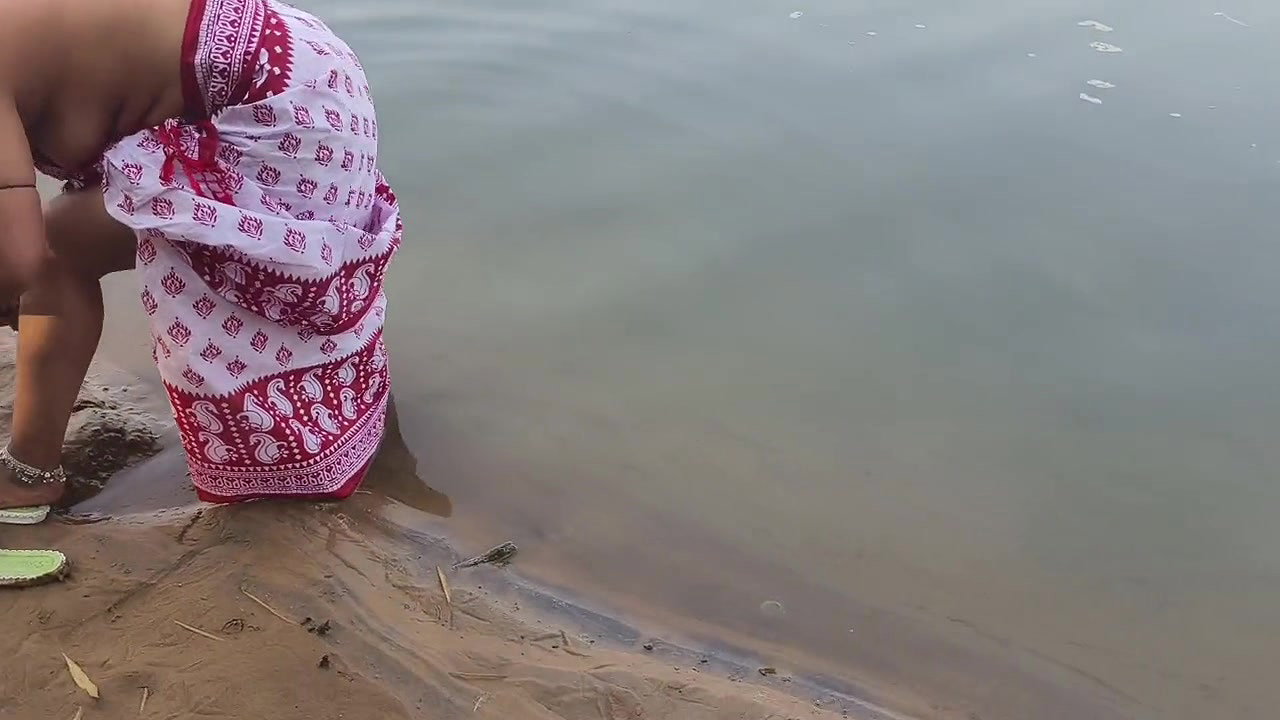 Indian Village Wife Bathing in the River in Outdoor Area