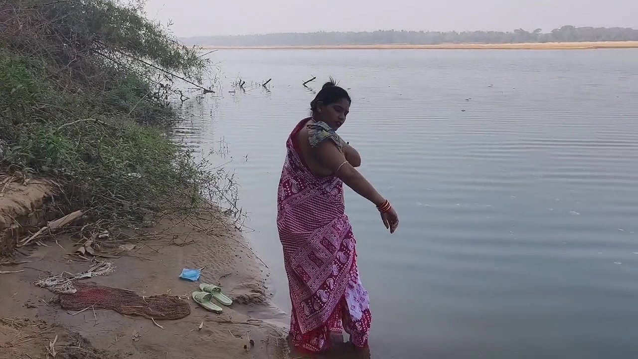 Indian Village Wife Bathing in the River in Outdoor Area