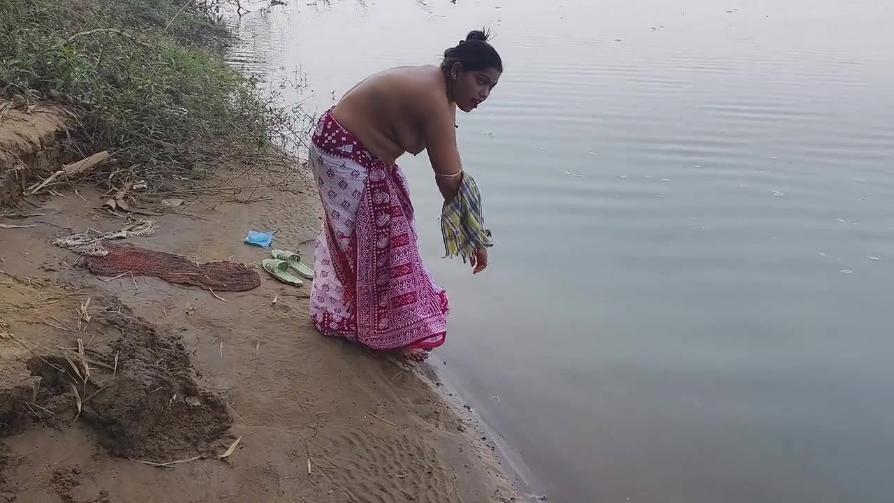 Indian Village Wife Bathing in the River in Outdoor Area