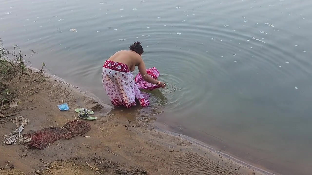 Indian Village Wife Bathing in the River in Outdoor Area