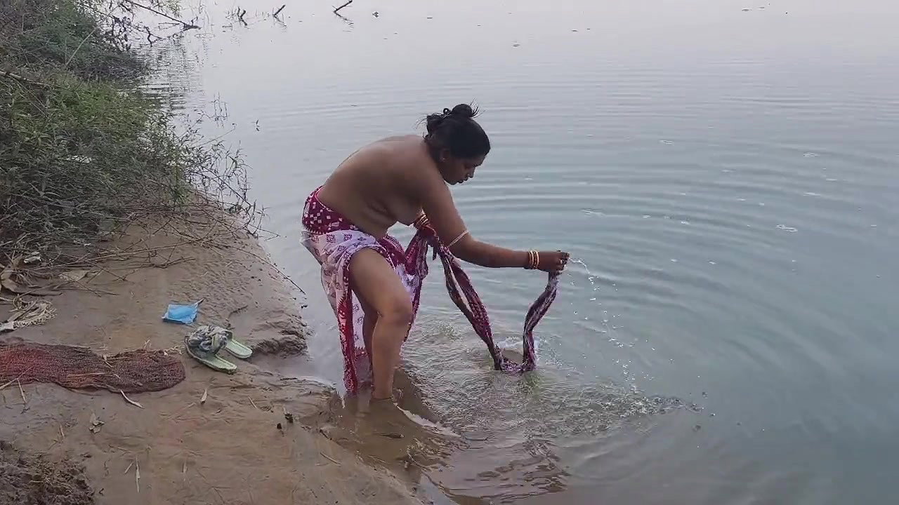 Indian Village Wife Bathing in the River in Outdoor Area