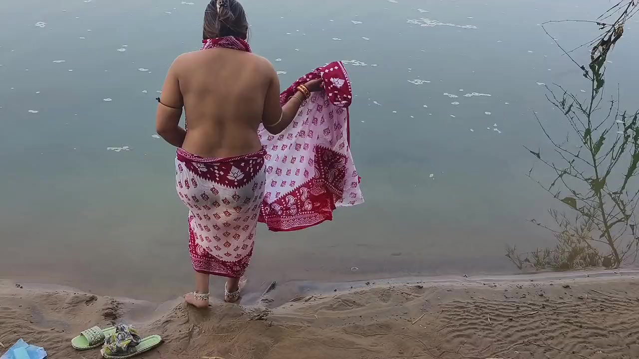 Indian Village Wife Bathing in the River in Outdoor Area