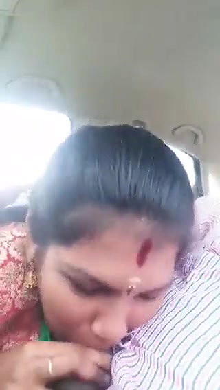 Giving blowjob in car