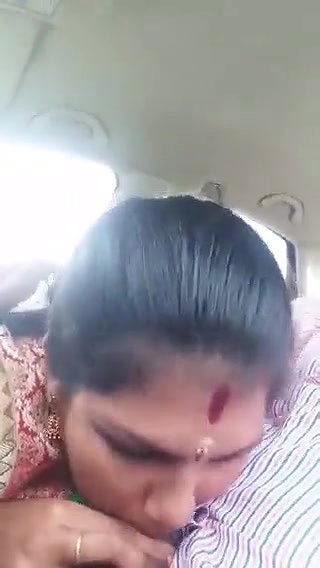 Giving blowjob in car