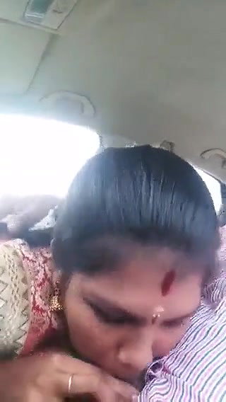 Giving blowjob in car