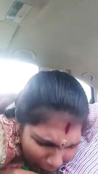 Giving blowjob in car
