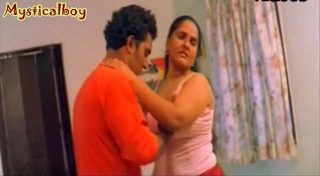 Hot Mallu actress Suvarna big mangoes being squeezed
