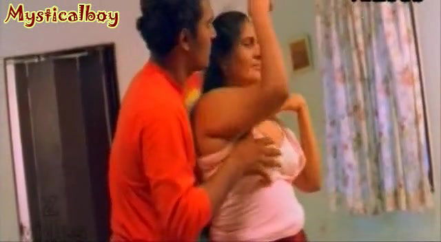 Hot Mallu actress Suvarna big mangoes being squeezed