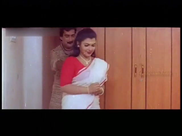 Sajini Erotica in Red Blouse and White Saree