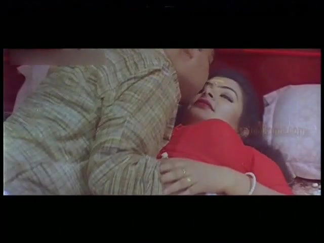 Sajini Erotica in Red Blouse and White Saree