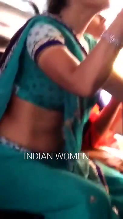 Aunty showing her navel in the bus