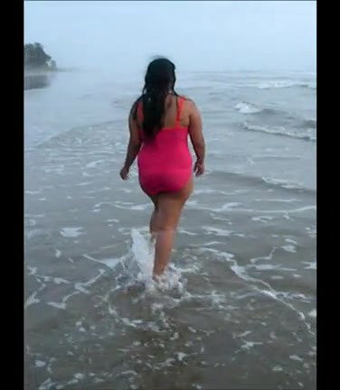 bhabhi walking at beach in swimwear