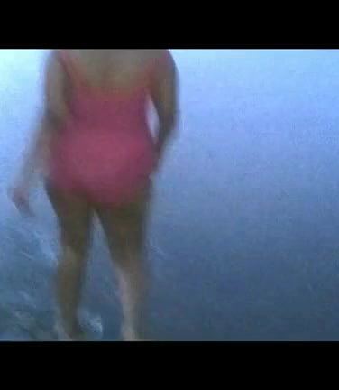 bhabhi walking at beach in swimwear