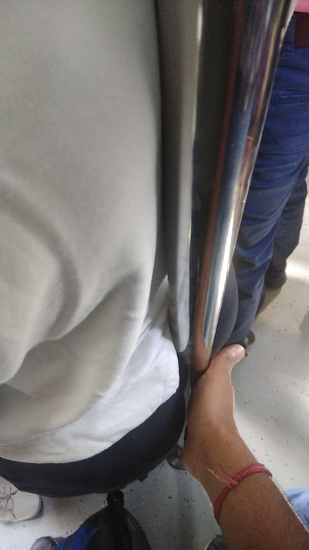 Desi Fleshy Ass cheeks split by pole, pressed gently