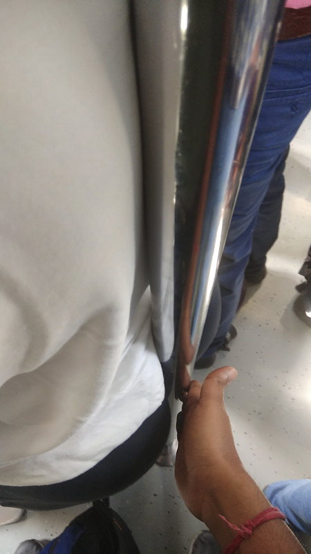 Desi Fleshy Ass cheeks split by pole, pressed gently