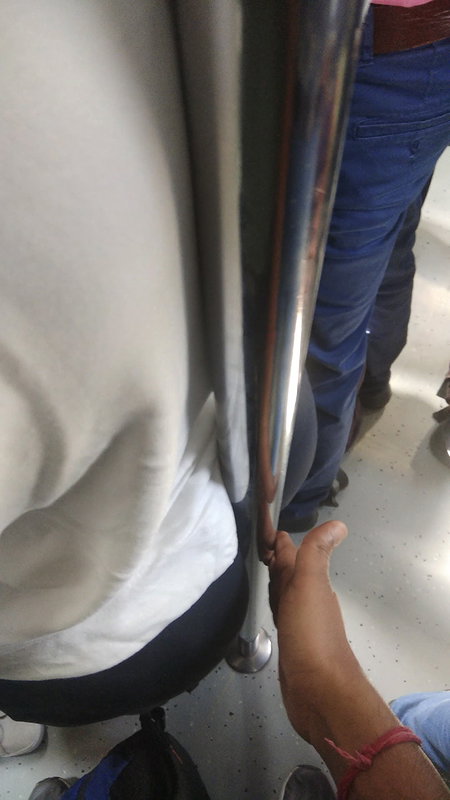 Desi Fleshy Ass cheeks split by pole, pressed gently