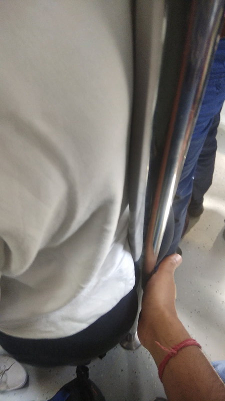 Desi Fleshy Ass cheeks split by pole, pressed gently