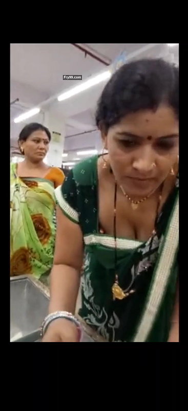 Desi milf awesome cleavage and boobs closeup in supermarket