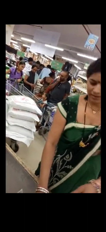 Desi milf awesome cleavage and boobs closeup in supermarket