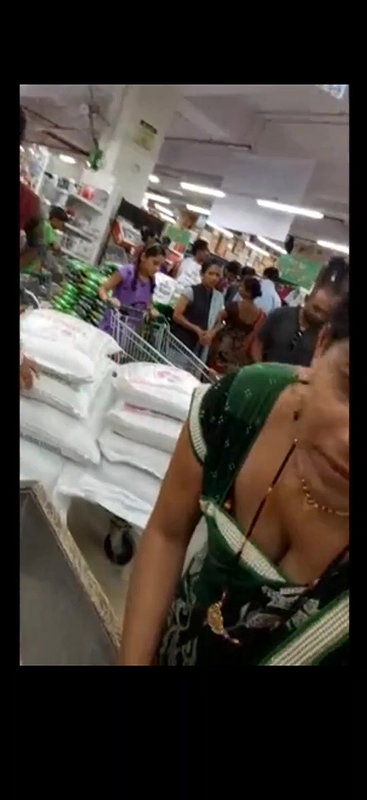 Desi milf awesome cleavage and boobs closeup in supermarket