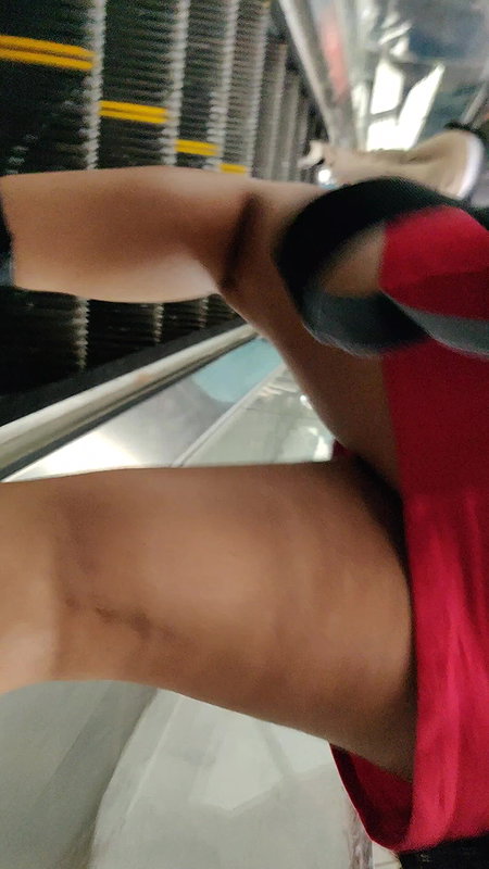 Desi young babe fleshy thighs closeup on escalator