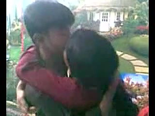 horny young lover kissing in a studio