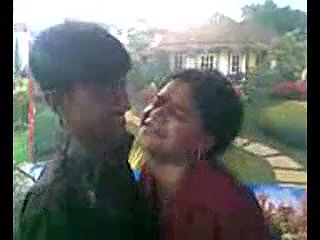 horny young lover kissing in a studio