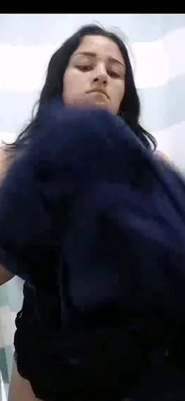 Hot babe caught in white bra and black panty