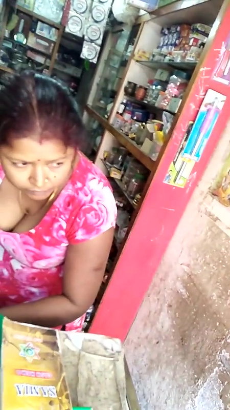Lady shopkeeper huge cleavage n boob show