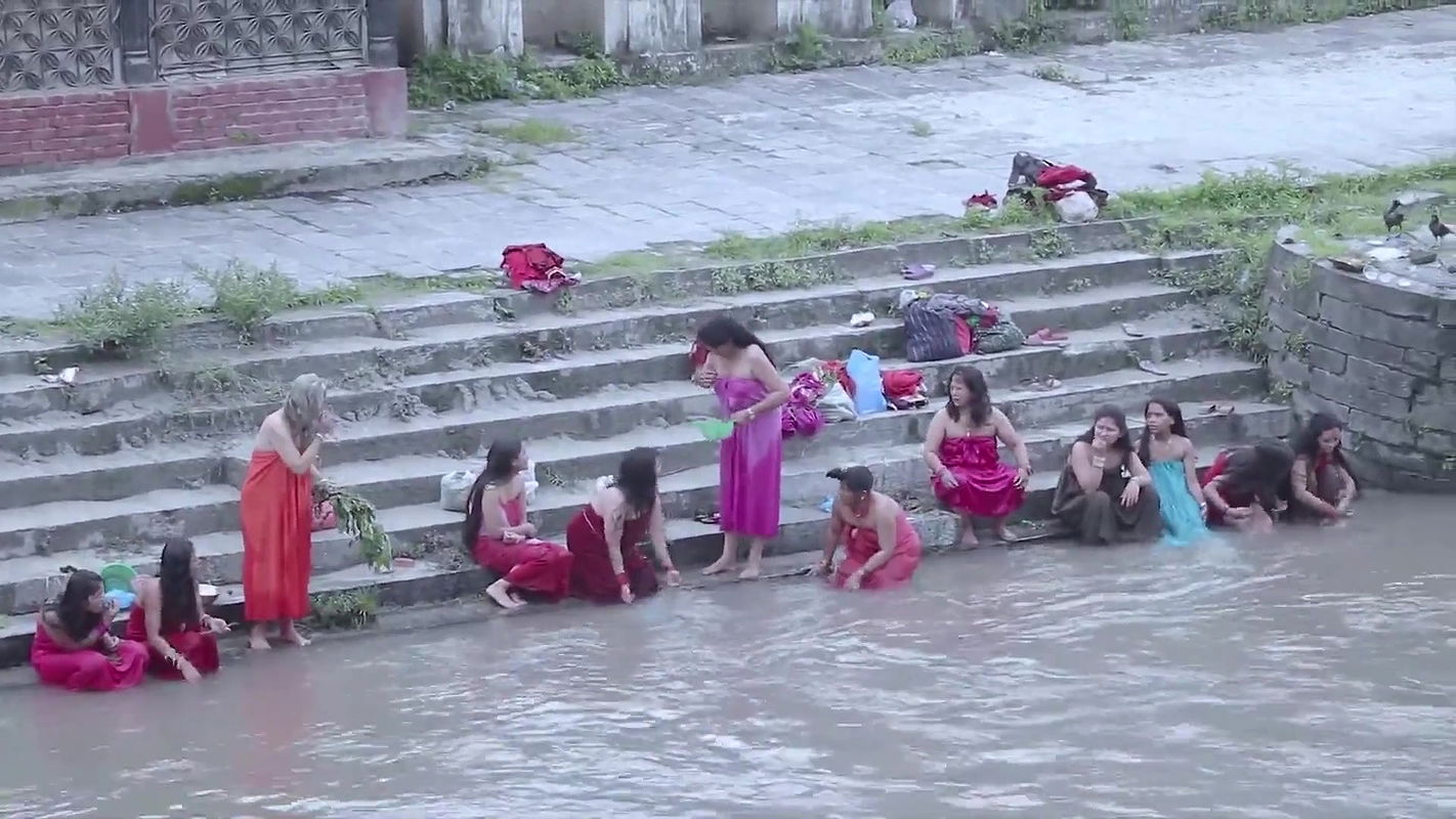 Nepali lady open bath.mkv