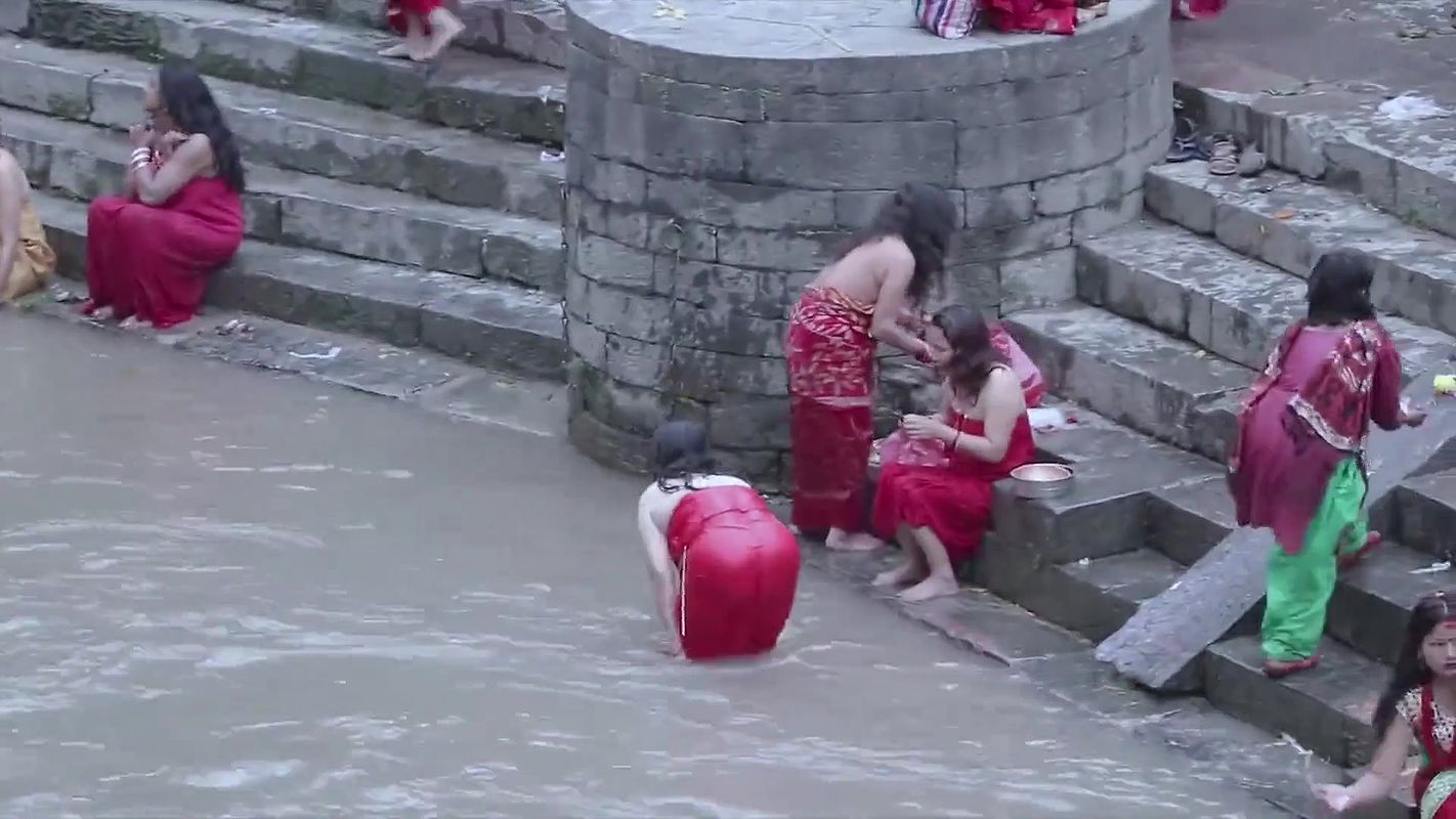 Nepali lady open bath.mkv