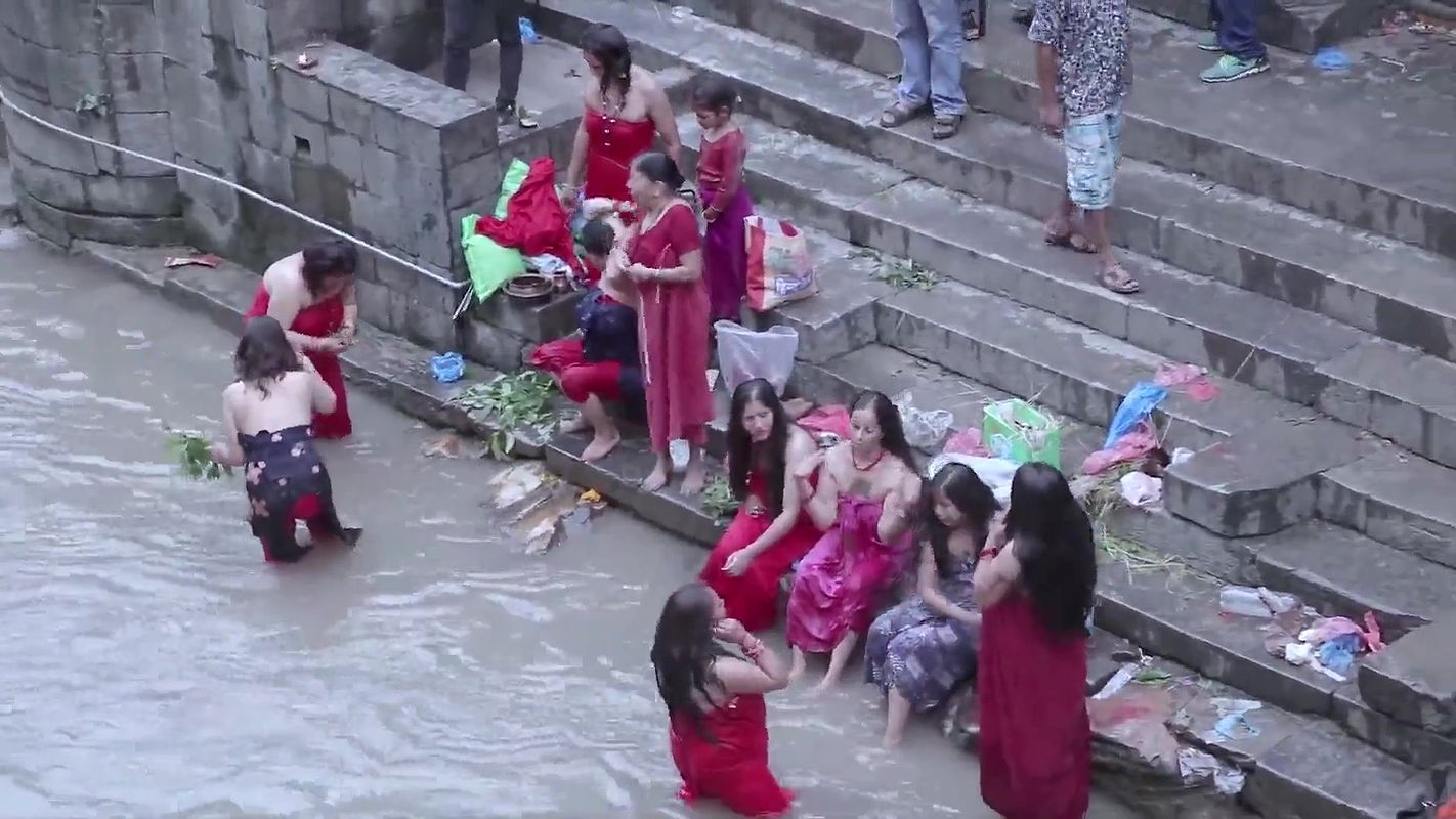 Nepali lady open bath.mkv