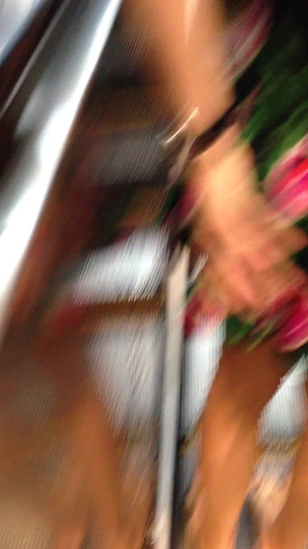 Upskirt thighs and ass closeup on escalator.MOV